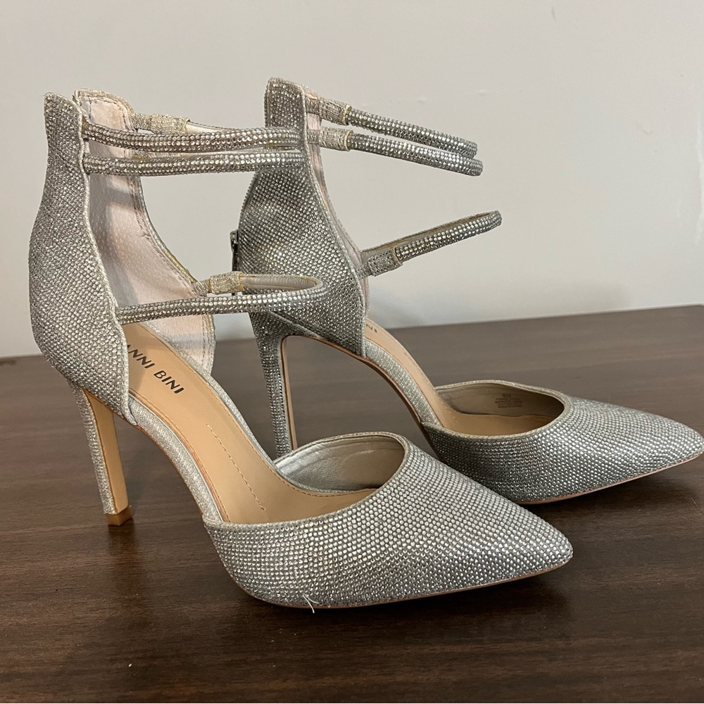 Brand new prom dress shoes. Silver with shimmery stones. Size 8M